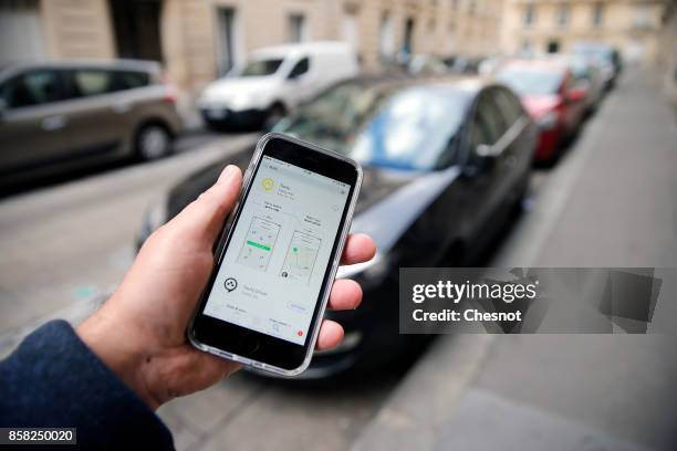 In this photo illustration, the Taxify company application is displayed on the screen of an Apple iPhone 6 on October 06, 2017 in Paris France. The...