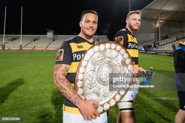 Jared Proffit of Taranaki poses with the Ranfurly Shield after the win in the round eight Mitre 10 Cup match between Canterbury and Taranaki at AMI...