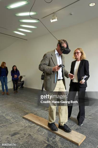 Visitor using VR-Glases of Toast Blank, Experience, 2016 assisted by Franziska Nori, curator and director seen during the 'Perception is Reality:...