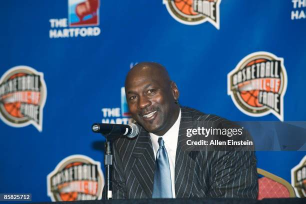 Former Chicago Bull guard Michael Jordan addresses the media after the Naismith Memorial Hall of Fame announced his induction to the class of 2009 at...