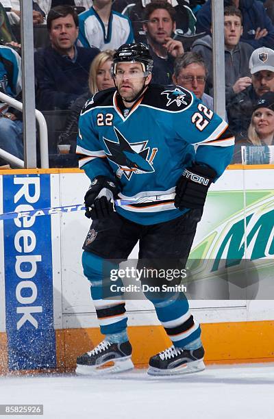 Dan Boyle of the San Jose Sharks watches the puck during a NHL game against the Phoenix Coyotes on March 28, 2009 at HP Pavilion at San Jose in San...