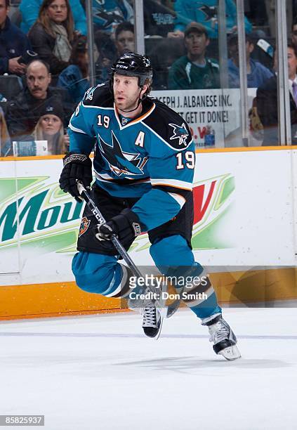 Joe Thornton of the San Jose Sharks skates toward the puck during a NHL game against the Phoenix Coyotes on March 28, 2009 at HP Pavilion at San Jose...