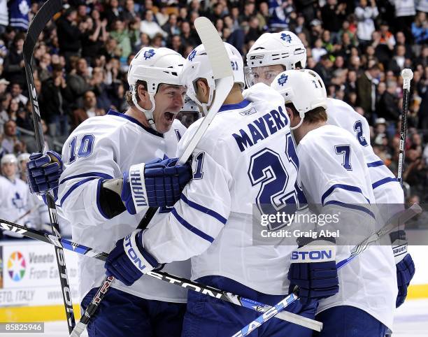 Brad May and Jamal Mayers of the Toronto Maple Leafs celebrate a first period goal against the Philadelphia Flyers during game action April 1, 2009...