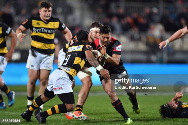 Richie Mo'unga of Canterbury is tackled during the round eight Mitre 10 Cup match between Canterbury and Taranaki at AMI Stadium on October 6, 2017...