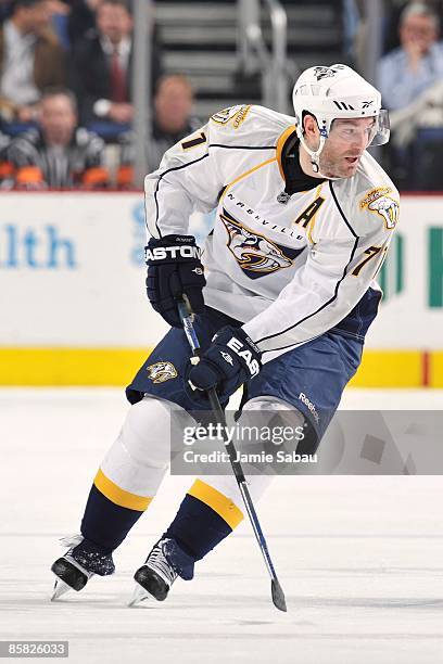 Forward J.P. Dumont of the Nashville Predators skates with the puck against the Columbus Blue Jackets on March 31, 2009 at Nationwide Arena in...