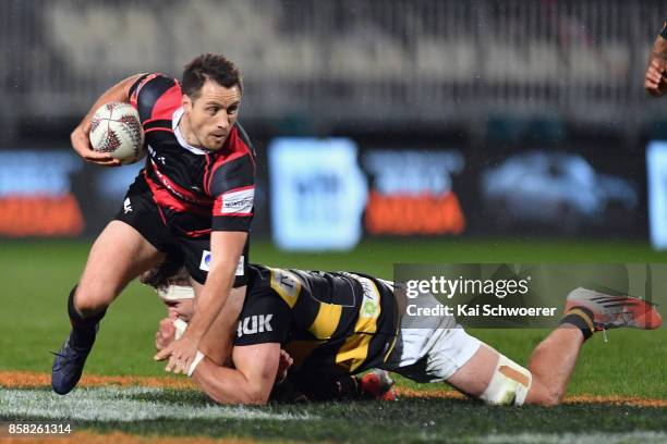 Tim Bateman of Canterbury is tackled during the round eight Mitre 10 Cup match between Canterbury and Taranaki at AMI Stadium on October 6, 2017 in...