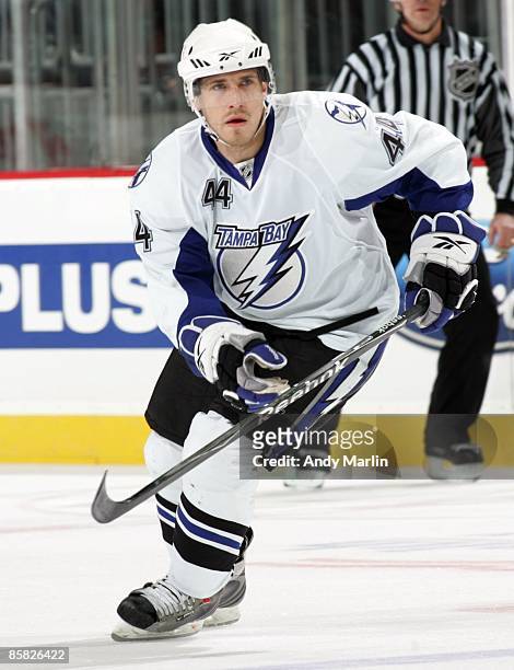 Martins Karsums of the Tampa Bay Lightning skates against the New Jersey Devils at the Prudential Center on April 3, 2009 in Newark, New Jersey. The...
