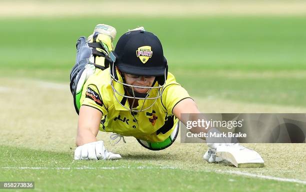 Nicole Bolton dives for the crease during the WNCL match between South Australia and Western Australia at Adelaide Oval No.2 on October 6, 2017 in...