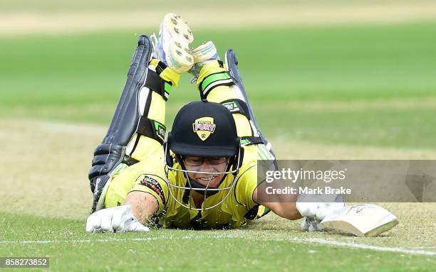 Nicole Bolton dives for the crease during the WNCL match between South Australia and Western Australia at Adelaide Oval No.2 on October 6, 2017 in...