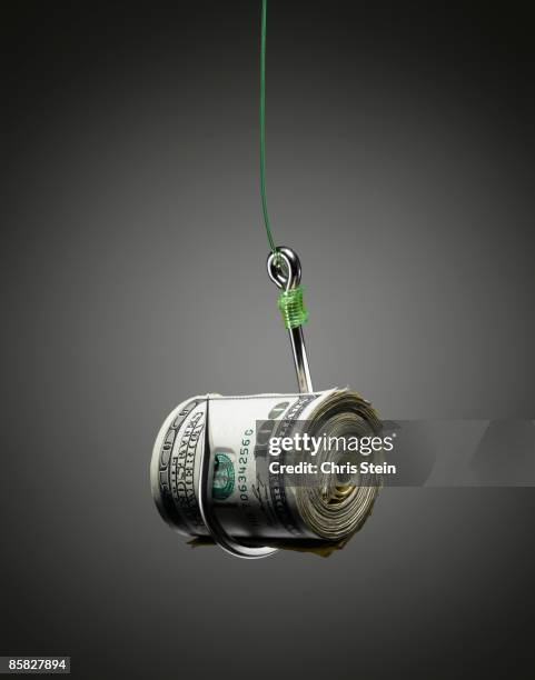 money baited on a hook. - fischköder stock-fotos und bilder