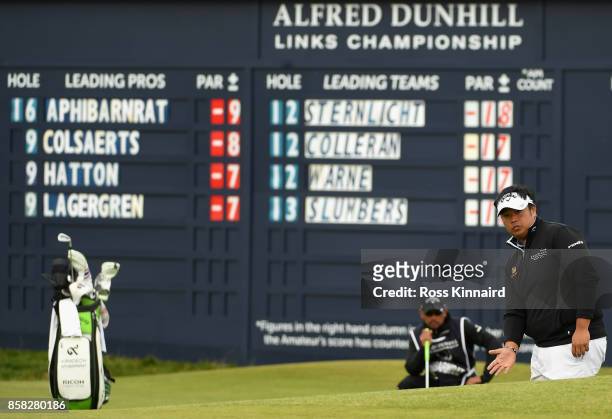 Kiradech Aphibarnrat of Thailand lines up his put on the 17th during day two of the 2017 Alfred Dunhill Championship at The Old Course on October 6,...