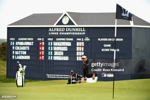 Kiradech Aphibarnrat of Thailand lines up his put on the 17th during day two of the 2017 Alfred Dunhill Championship at The Old Course on October 6,...