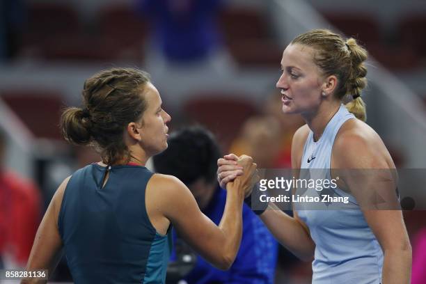 Petra Kvitova of the Czech Repubic is congratulated by Barbora Strycova of the Czech Republic after winning the Women's singles Quarterfinals match...
