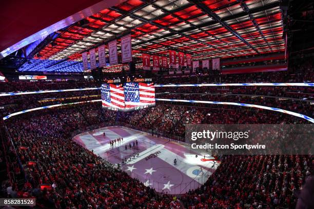 The National Anthem is played prior to the Detroit Red Wings game versus the Minnesota Wild on October 5 at Little Caesars Arena in Detroit, Michigan.