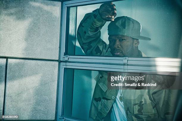 Rapper 50 Cent poses for a portrait session in Los Angeles for AOL.