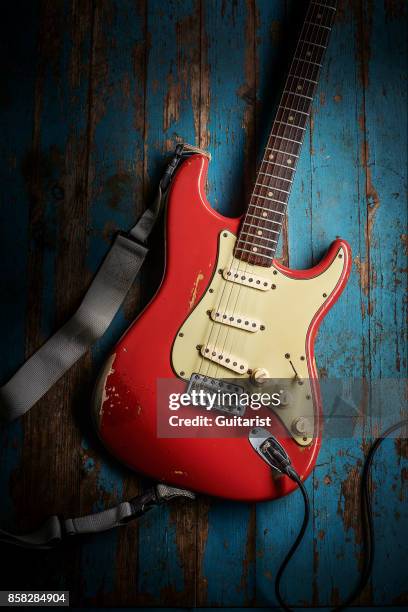 Vintage 1961 Fender Stratocaster electric guitar with a Fiesta Red finish, previously owned by Northern Irish musician Gary Moore, taken on October...