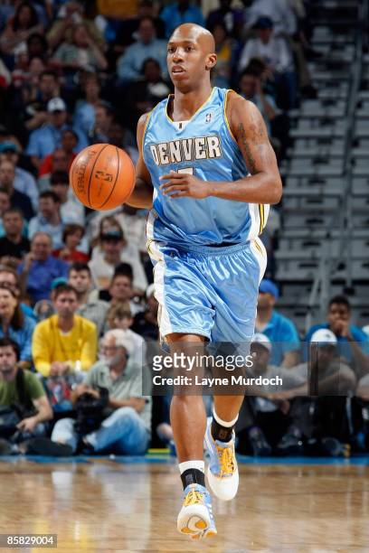 Chauncey Billups of the Denver Nuggets brings the ball upcourt against the New Orleans Hornets during the game on March 25, 2009 at the New Orleans...