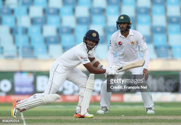 Dinesh Chandimal of Sri Lanka bats during Day One of the Second Test between Pakistan and Sri Lanka at Dubai International Cricket Ground on October...