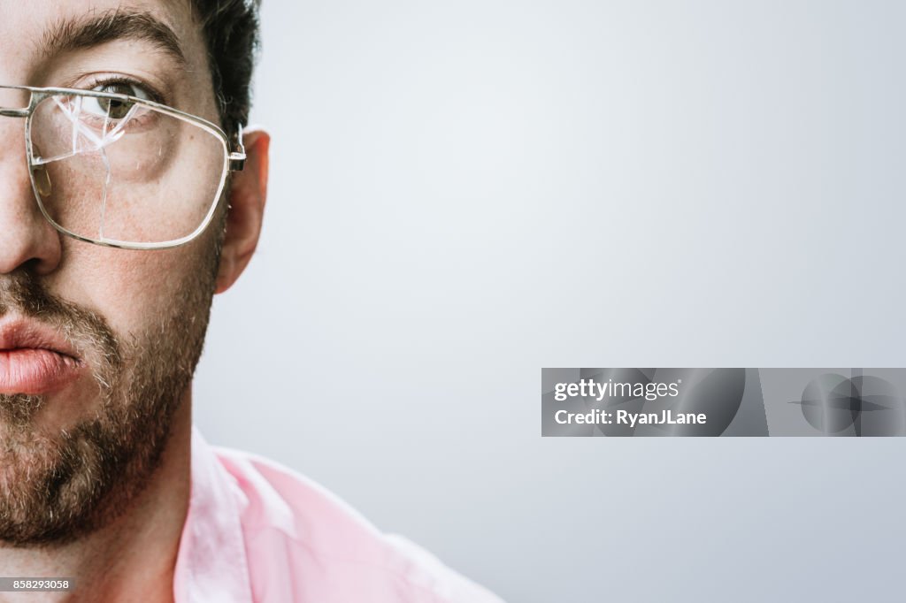 Man With Broken Eyeglasses