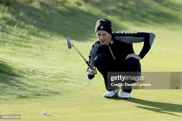 Matthew Goode of England the film and television actor lines up a putt on the second hole during the second round of the 2017 Alfred Dunhill Links...