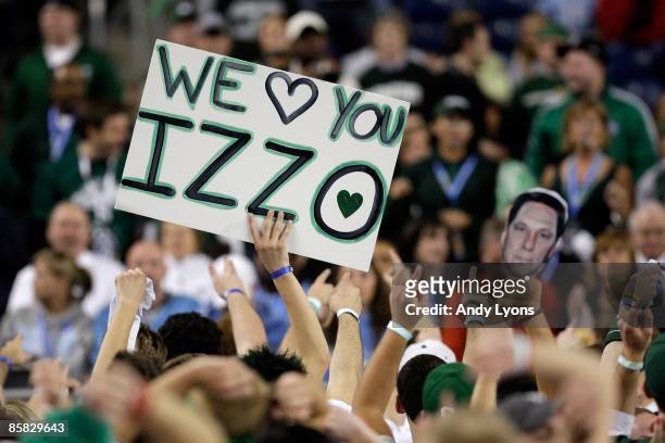 Fan of the Michigan State Spartans holds up a sign which reads "We love you Izzo" in support of Michigan State head coach Tom Izzo against the North...