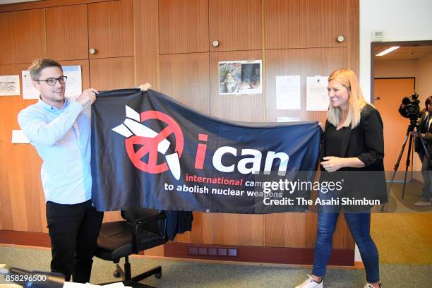 Beatrice Fihn , executive director of the International Campaign to Abolish Nuclear Weapons celebratetes with a staff after the Nobel Peace Prize is...