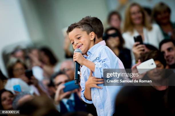 Model walks the runway during 'The Petite Fashion Week' at the Cibeles Palace on October 6, 2017 in Madrid, Spain.