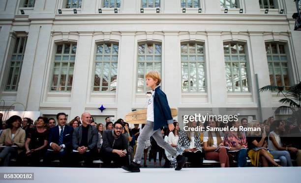 Model walks the runway during 'The Petite Fashion Week' at the Cibeles Palace on October 6, 2017 in Madrid, Spain.