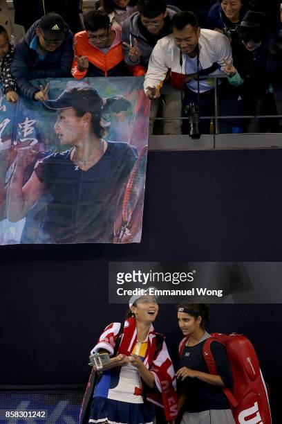 Sania Mirza of India and Shuai Peng of China take a selfie after winning their Women's double quarterfinal match against Katerina Siniakova of Czech...
