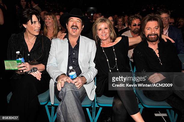 Kix Brooks and wife Barbara with Ronnie Dunn and wife Janine pose during the 44th annual Academy Of Country Music Awards' Artist of the Decade held...
