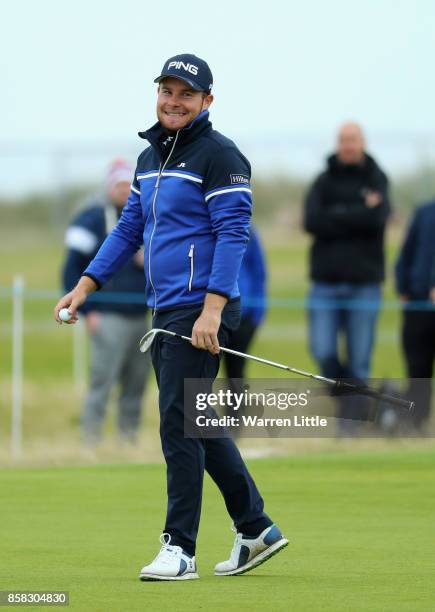 Tyrrell Hatton of England celebrates chipping in on the 16th hole during day two of the 2017 Alfred Dunhill Championship at Carnoustie on October 6,...