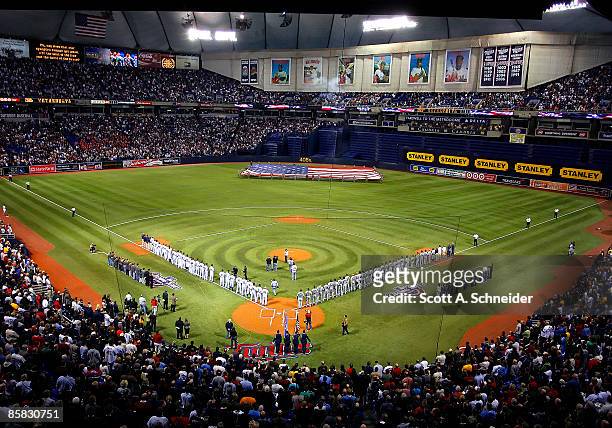 The national anthem is played at the Minnesota Twins Opening Day game against the Seattle Mariners on April 6, 2009 at the Metrodome in Minneapolis,...