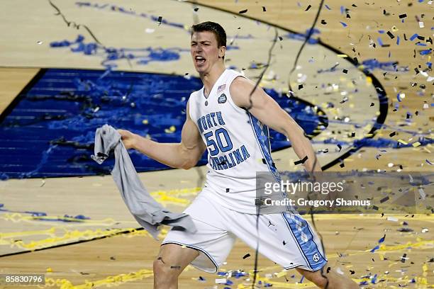 Tyler Hansbrough of the North Carolina Tar Heels celebrates with his teammates after they won 89-72 against the Michigan State Spartans during the...