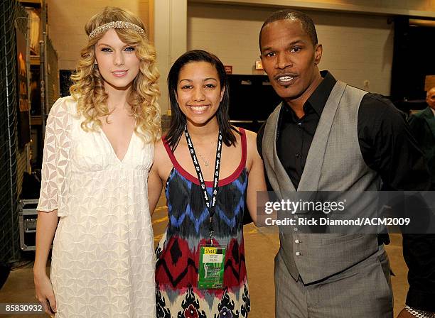 Singer/musician Taylor Swift, Corinne Foxx and father actor Jamie Foxx pose backstage during the 44th annual Academy Of Country Music Awards' Artist...