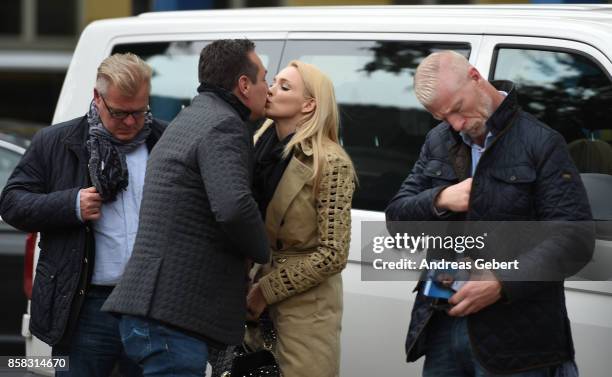 Heinz-Christian Strache of the right-wing Austria Freedom Party kisses his wife Philippa on his arrival at an election campaign rally on October 6,...