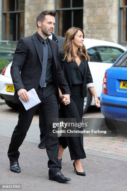 Sylvain Longchambon and Samia Longchambon depart the funeral of actress Liz Dawson at Salford Cathedral on October 6, 2017 in Salford, England....