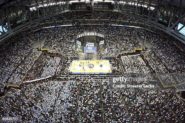 General view of Tyler Hansbrough of the North Carolina Tar Heels celebrates with his teammates as the Michigan State Spartans leave the court after...