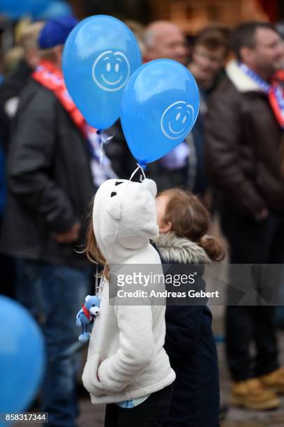 Two girls with balloons attend an election campaign rally of Heinz-Christian Strache of the right-wing Austria Freedom Party on October 6, 2017 in...