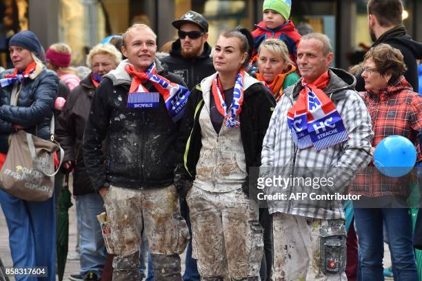 Supporters attend a campaign meeting of the chairman of the far-right Freedom Party of Austria on October 6, 2017 in Saalfelden ahead of the snap...