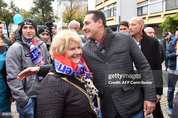 Heinz-Christian Strach, the chairman of the far-right Freedom Party of Austria , greets supporters during a campaign meeting on October 6, 2017 in...