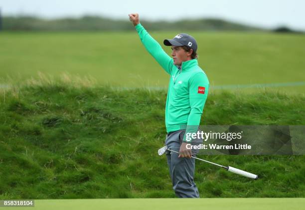 Paul Dunne of Ireland celebrates making a birdie on the 16th during day two of the 2017 Alfred Dunhill Championship at Carnoustie on October 6, 2017...