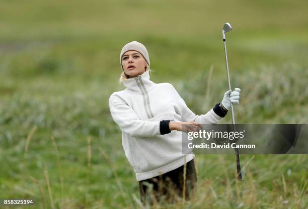 Kelly Rohrbach the American Baywatch film and television actress plays a shot on the 18th hole during the second round of the 2017 Alfred Dunhill...