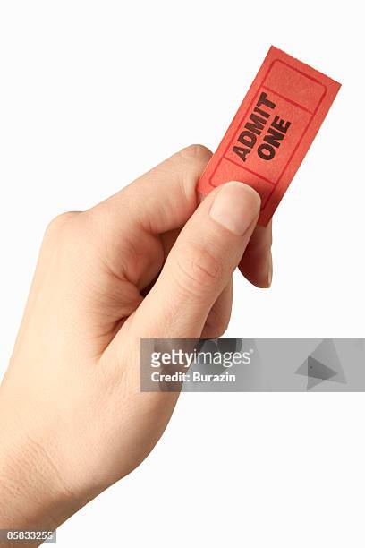 woman's hand holding ticket - ticket fotografías e imágenes de stock