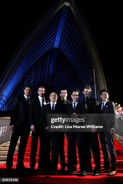 Karl Urban, Chris Pine, Zachary Quinto, J.J. Abrams, Eric Bana and John Cho pose in front of Sydney's Iconic Opera House during the world premiere of...