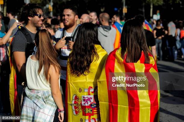 Students walking with Spanish and Catalonia flags, during the Catalonia general strike after the Catalonia independence referendum, declared ilegal...