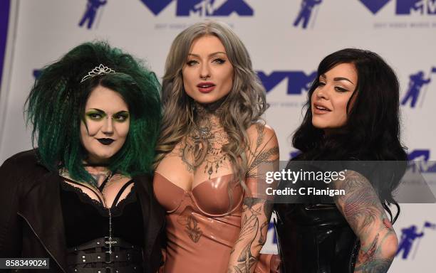 Kelly Doty, Ryan Ashley Malarkey and Nikki Simpson of 'Ink Master: Angels' arrive at the 2017 MTV Video Music Awards at The Forum on August 27, 2017...