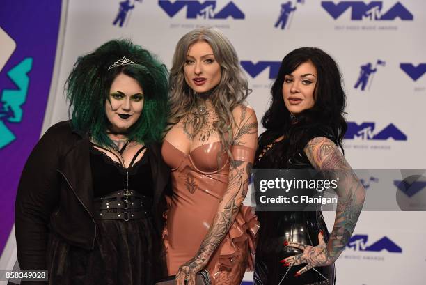 Kelly Doty, Ryan Ashley Malarkey and Nikki Simpson of 'Ink Master: Angels' arrive at the 2017 MTV Video Music Awards at The Forum on August 27, 2017...