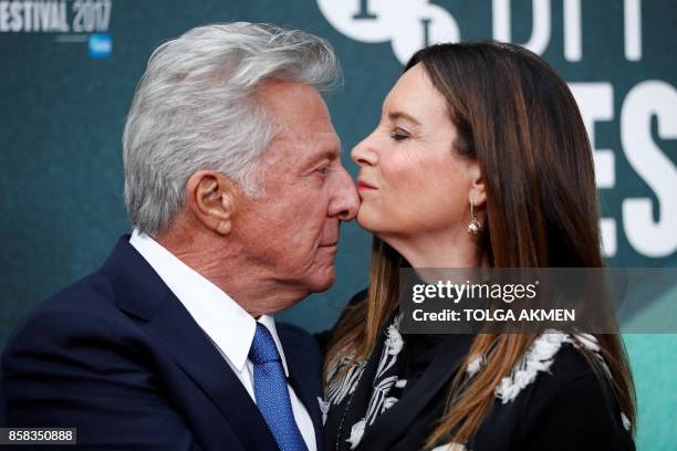 Actor Dustin Hoffman and his wife Lisa Hoffman pose upon arrival for the UK premiere of the film "The Meyerowitz Stories" during the BFI London Film...