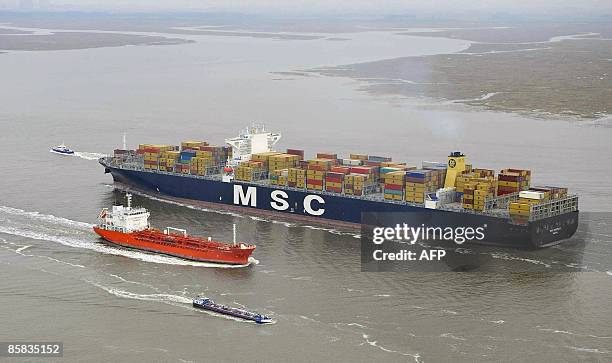 An aerial view of the MSC Beatrice container ship, one of the world's largest ones with 14,000 TEU , as it enters the port of Antwerp via the Scheldt...