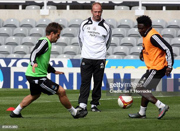 Manager Alan Shearer watches Michael Owen and Obafemi Martins during the Newcastle United open day team training session at St James' Park on April...